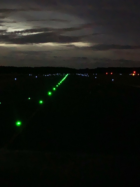 Green Lights Highlighting the Runway