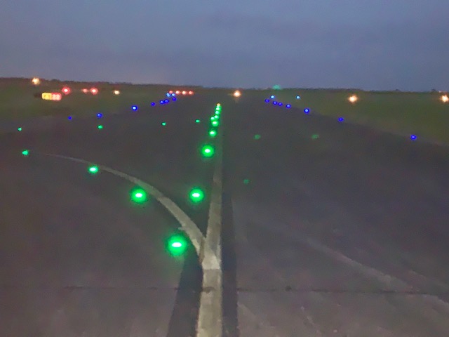 Green Lights On Divider Of Runway
